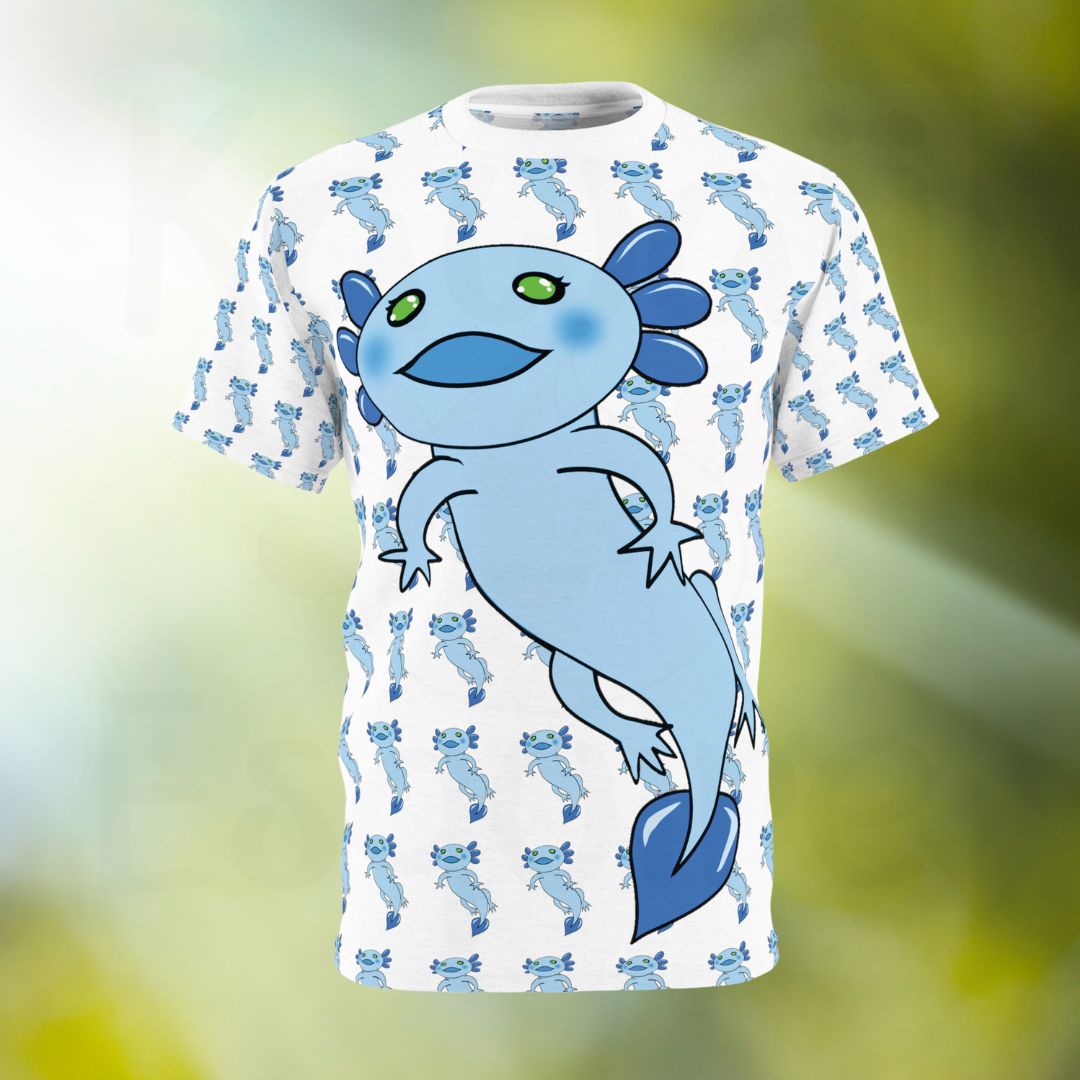 The image shows a white t-shirt featuring an all-over print design of a blue axolotl. The design consists of a large, central axolotl with green eyes and a smiling face, surrounded by a pattern of smaller axolotls. The smaller axolotls are uniformly scattered across the shirt. 