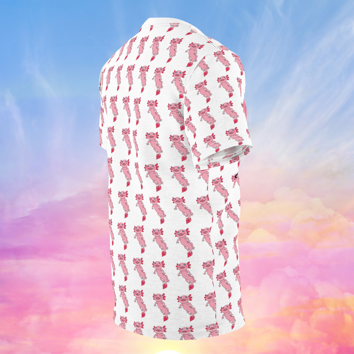 The image displays the side/back view of an all-over print t-shirt featuring a cute pink axolotl design. The background of the shirt is white with a repeating pattern of smaller pink axolotls throughout. Unlike the front, there is no large axolotl figure; instead, the smaller pink axolotls form a consistent pattern across the entire back of the shirt. 
