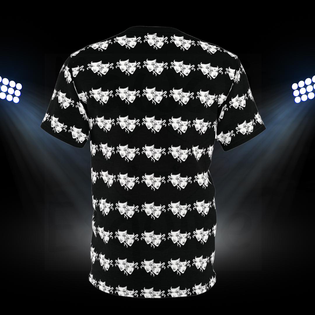 The image shows the back of a black t-shirt featuring an all-over print design of white drama masks. The drama masks, depicting one happy and one sad face, are arranged in a consistent, repeating pattern covering the entire back of the shirt, including the sleeves. The masks are intricately designed, adding a dramatic and artistic flair to the t-shirt. 