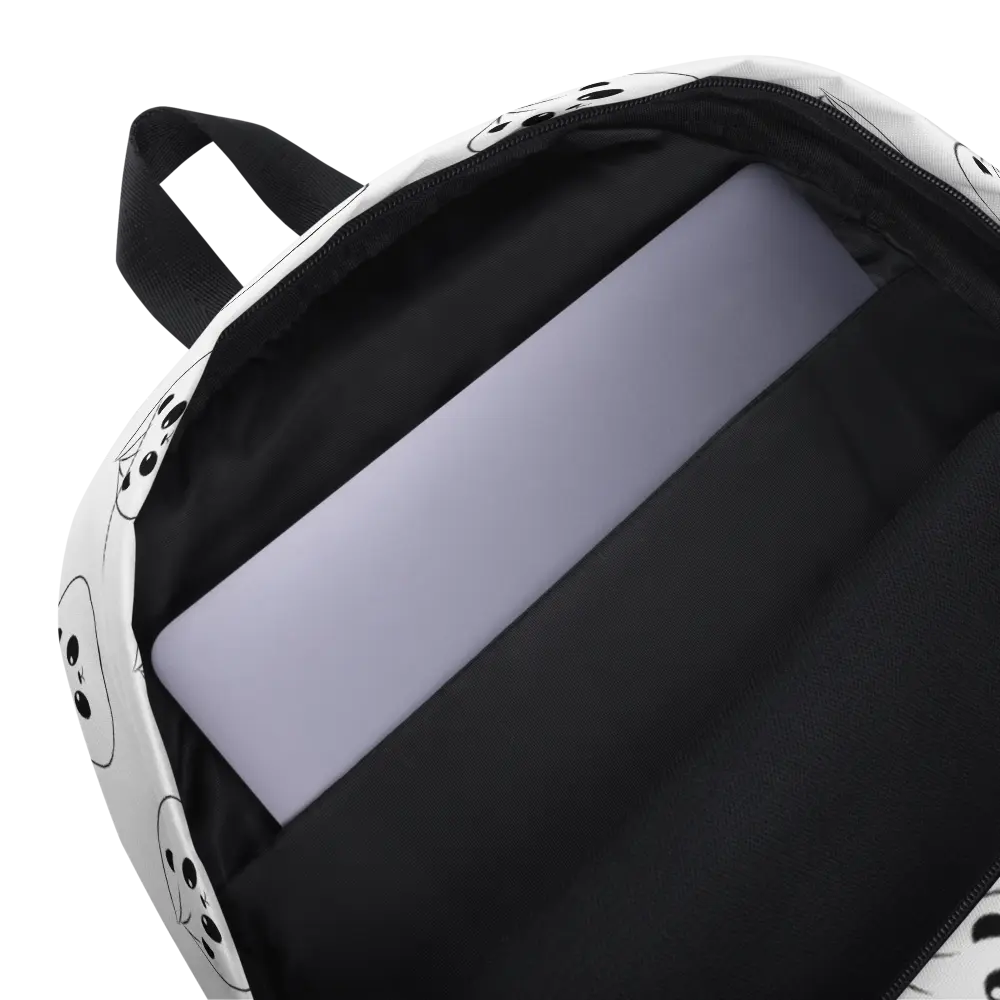 The interior of a white backpack featuring a padded laptop compartment.