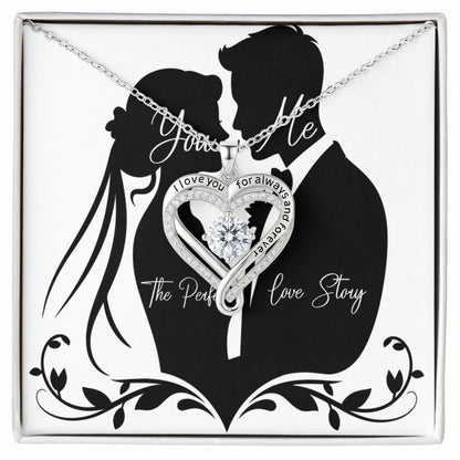 Love You Always Necklace featuring a heart-shaped pendant with a cubic zirconia center and engraved message, presented in an elegant box with a couple silhouette background.