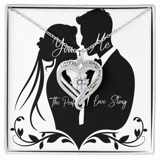Love You Always Necklace featuring a heart-shaped pendant with a cubic zirconia center and engraved message, presented in an elegant box with a couple silhouette background.