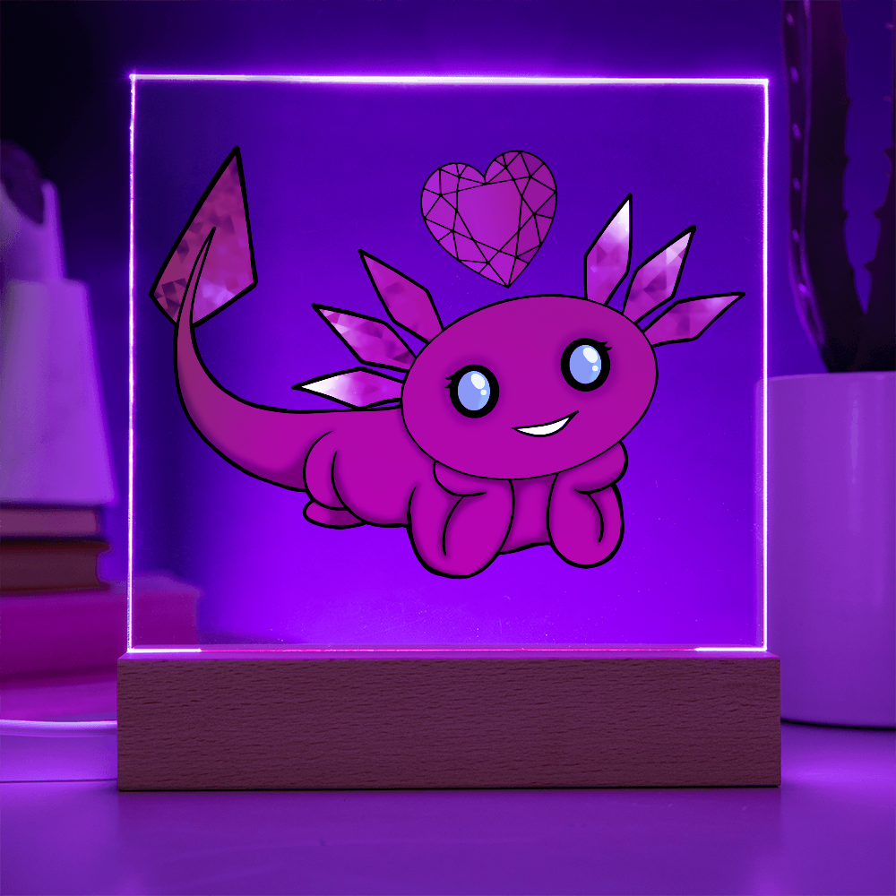 Red axolotl birthstone acrylic LED light illuminated with purple lighting