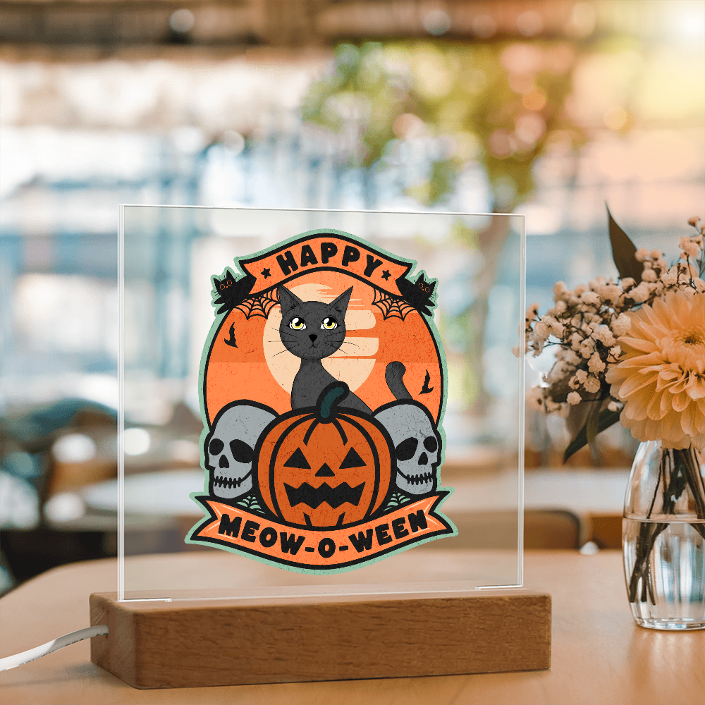 Light up Halloween with the Happy Meow-o-Ween LED acrylic plaque featuring a cute gray cat and pumpkin. A glowing Halloween gift perfect for cat lovers and spooky décor.