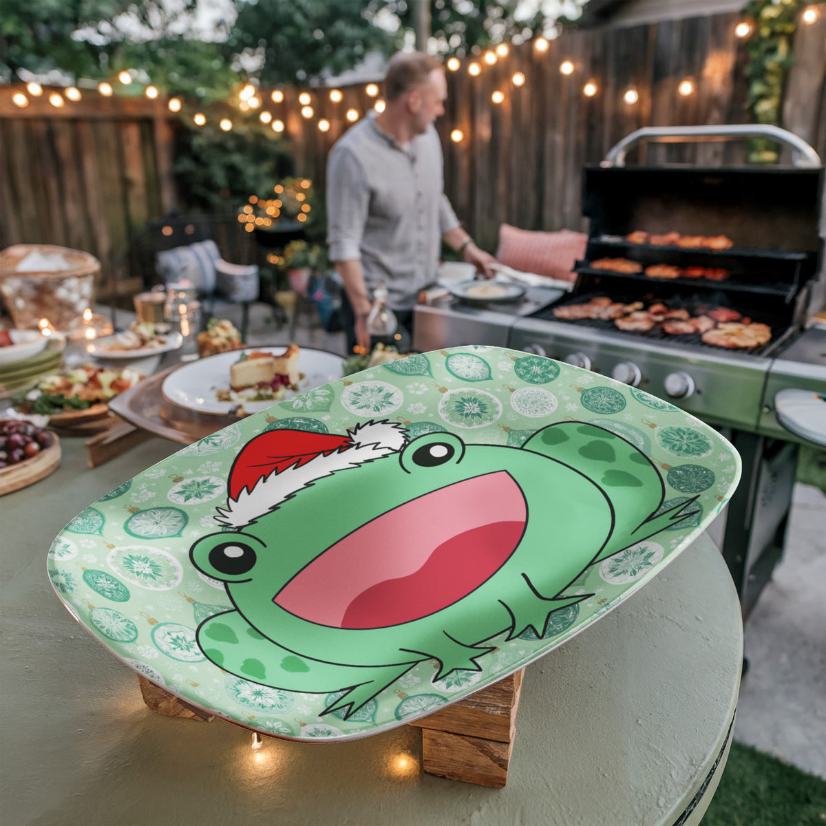 Christmas frog platter displayed near outdoor grill